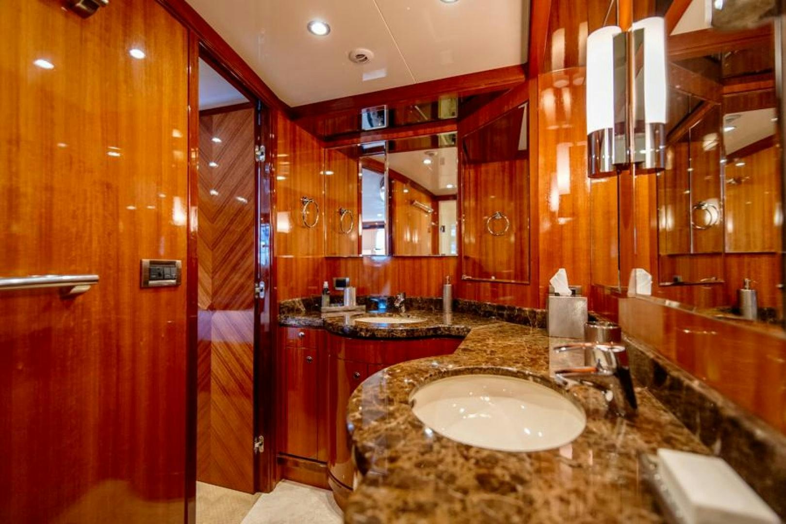 a bathroom with a marble counter top aboard LODESTAR Yacht for Sale