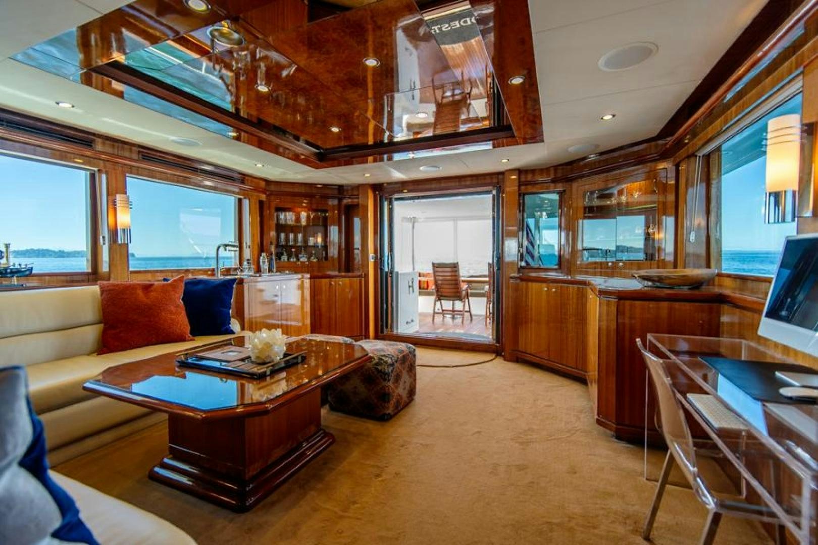 a living room with a large wood ceiling aboard LODESTAR Yacht for Sale