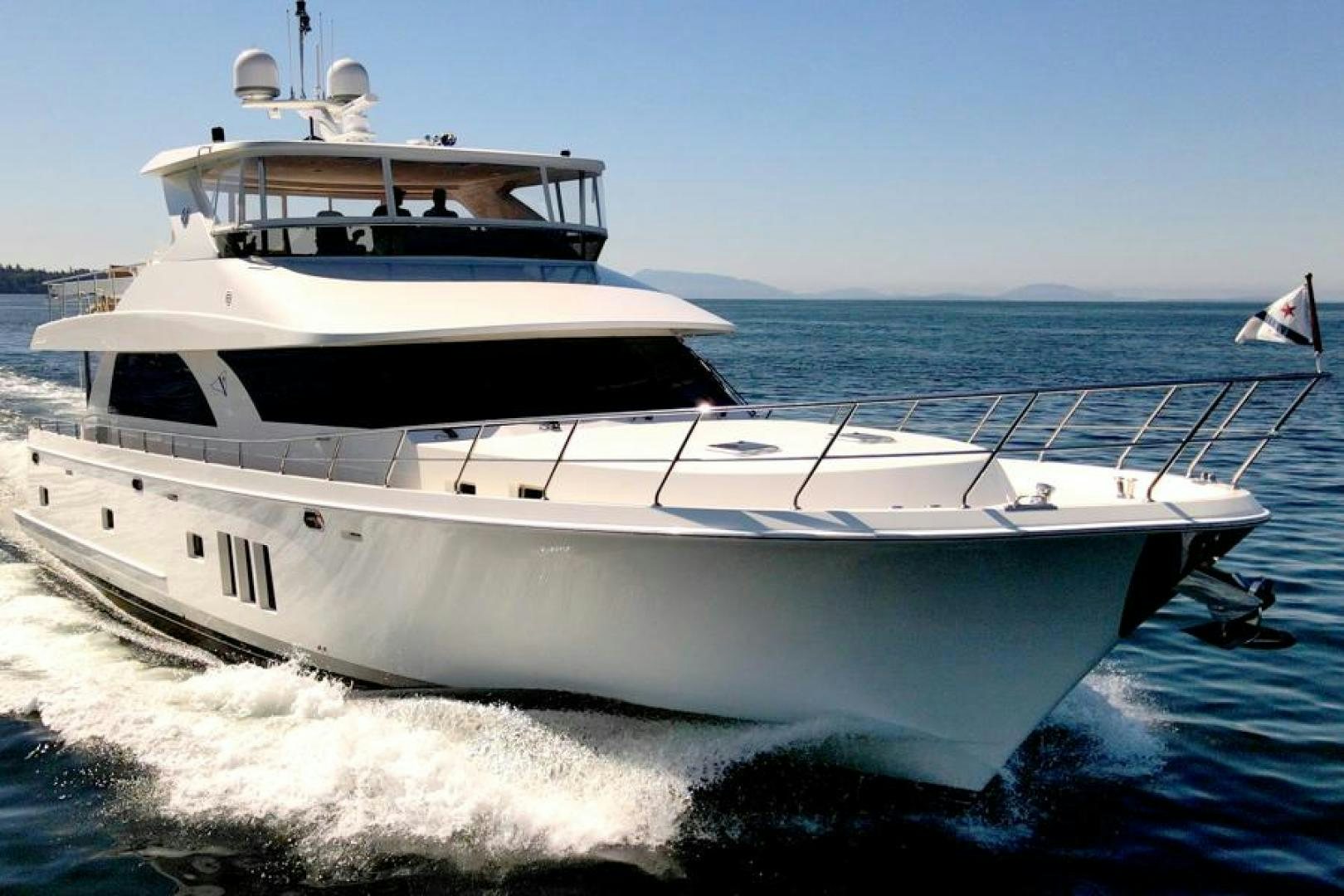 a white yacht on the water aboard LODESTAR Yacht for Sale