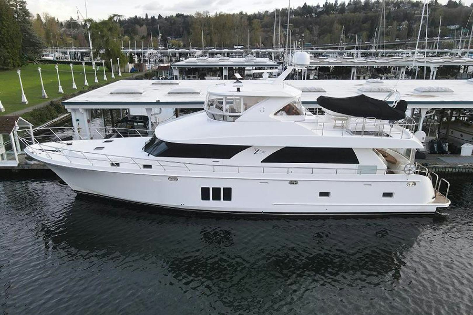 a group of boats are parked in a harbor aboard LODESTAR Yacht for Sale