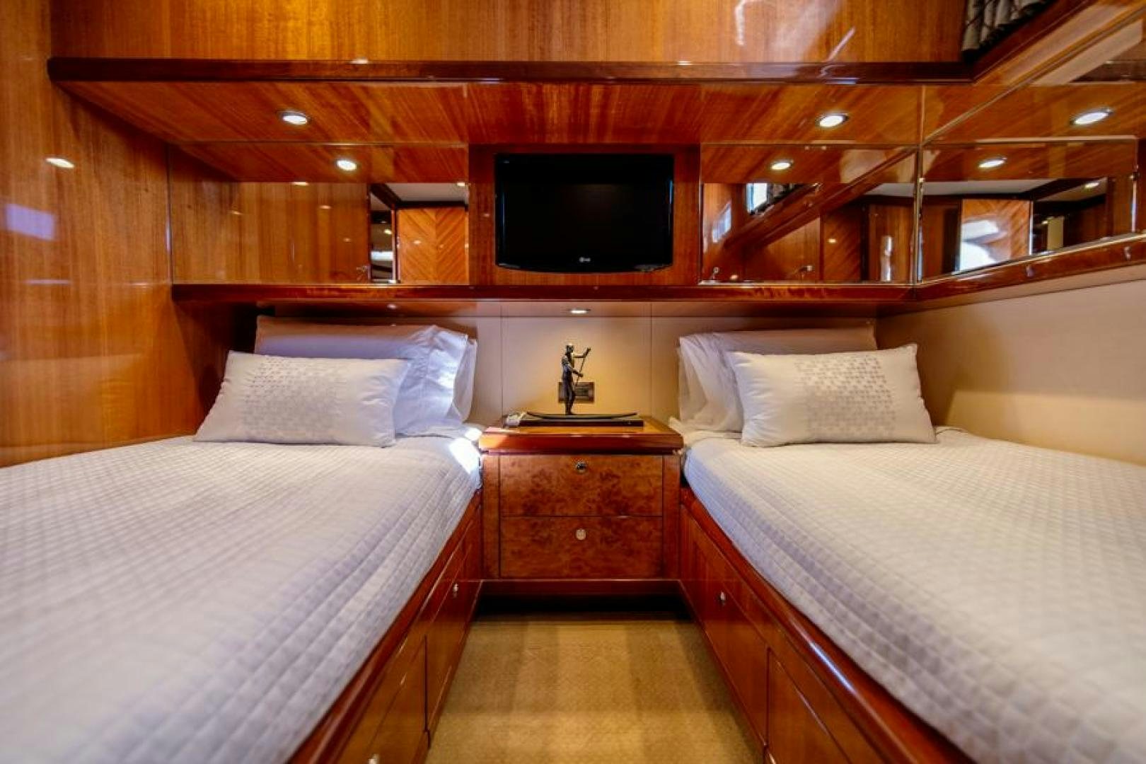 a couple of beds in a cabin aboard LODESTAR Yacht for Sale