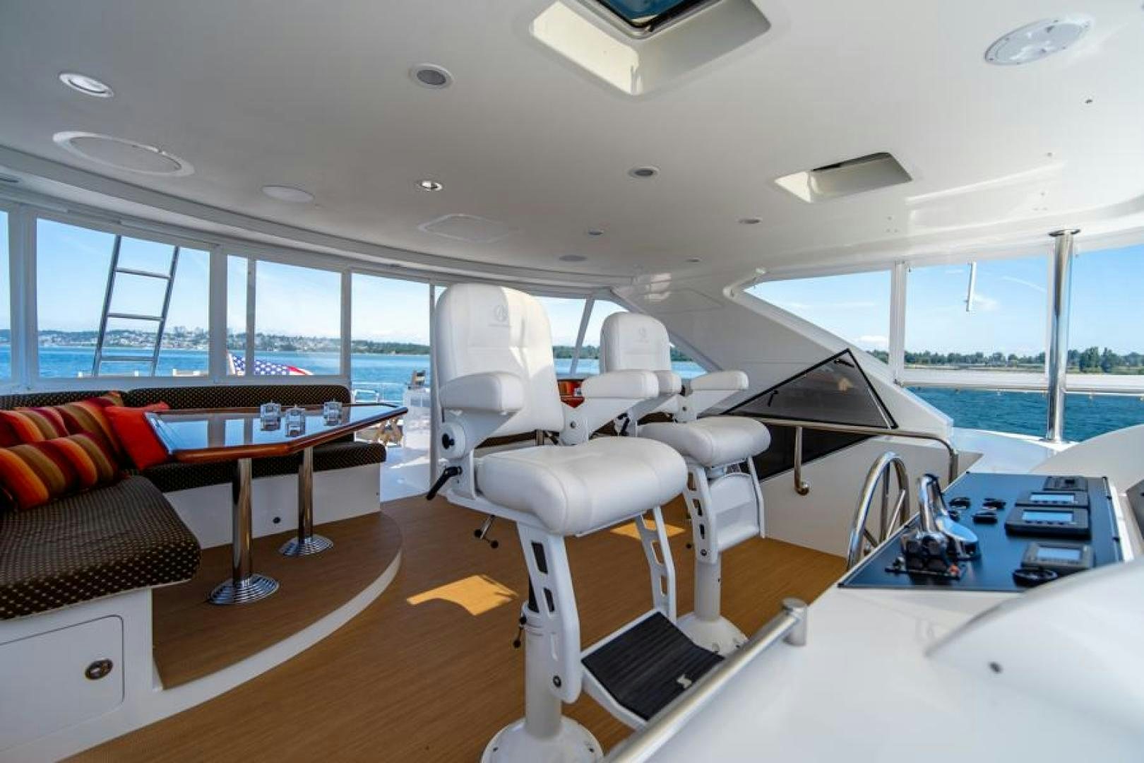 a room with a view of the ocean and the deck aboard LODESTAR Yacht for Sale