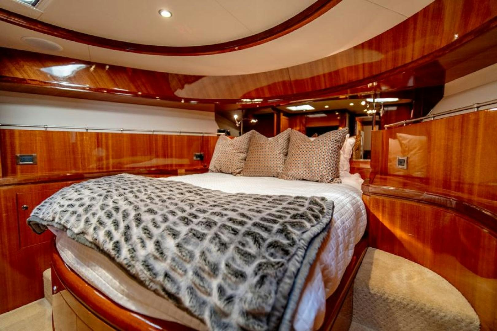 a room with a bed and a couch aboard LODESTAR Yacht for Sale