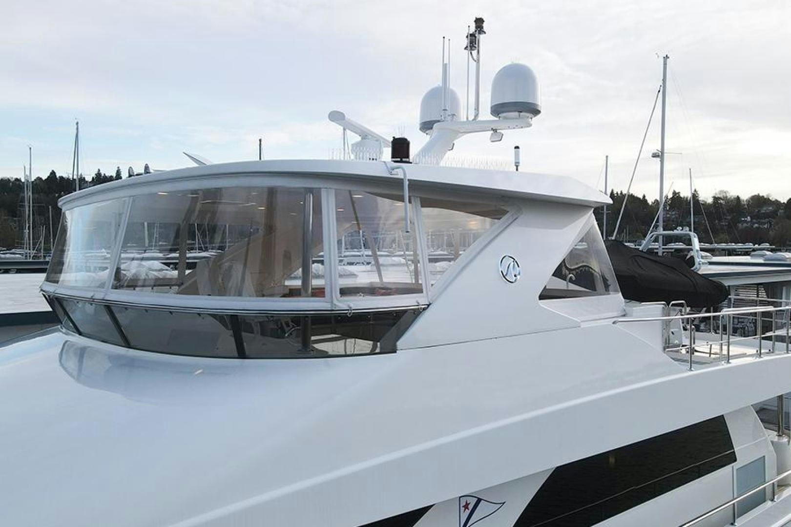 a white yacht docked aboard LODESTAR Yacht for Sale
