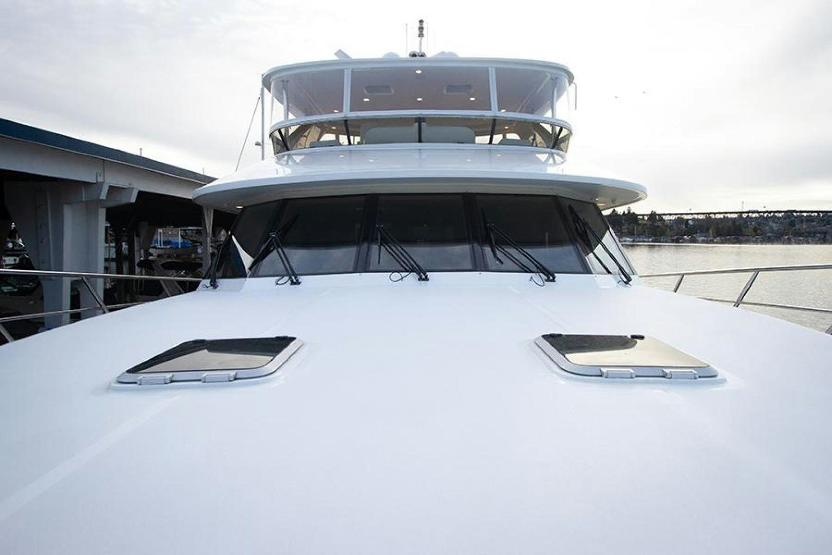 a white car with a white roof aboard LODESTAR Yacht for Sale