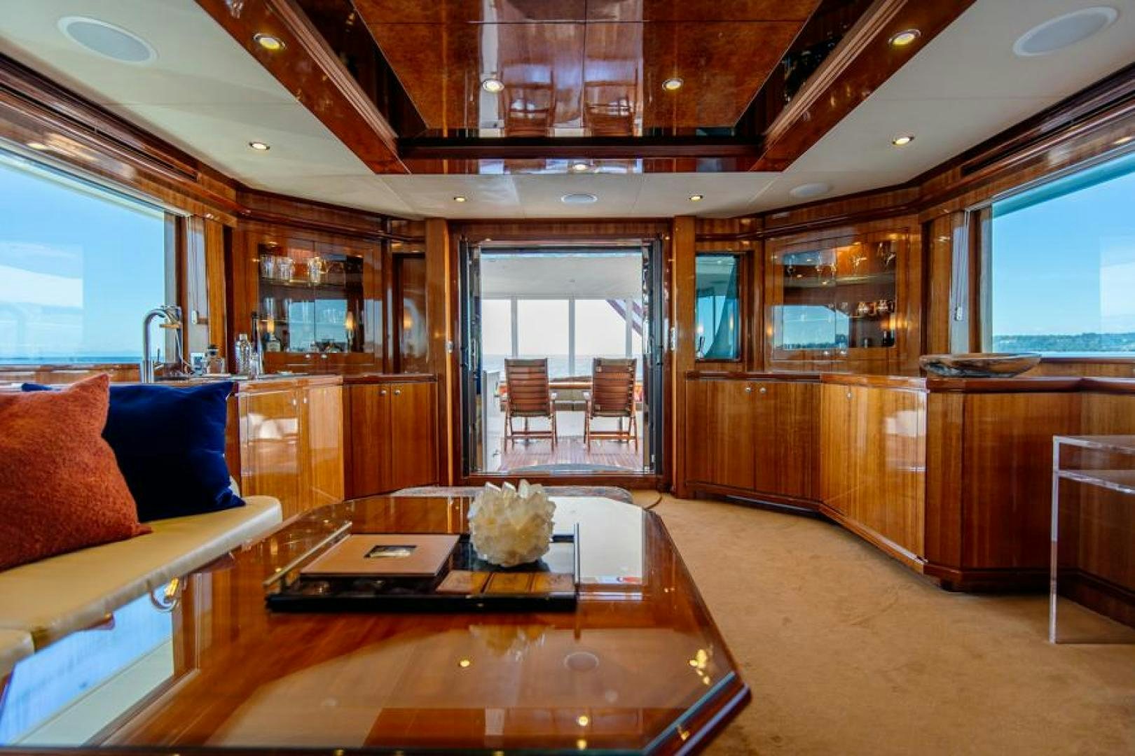 a room with a table and chairs aboard LODESTAR Yacht for Sale