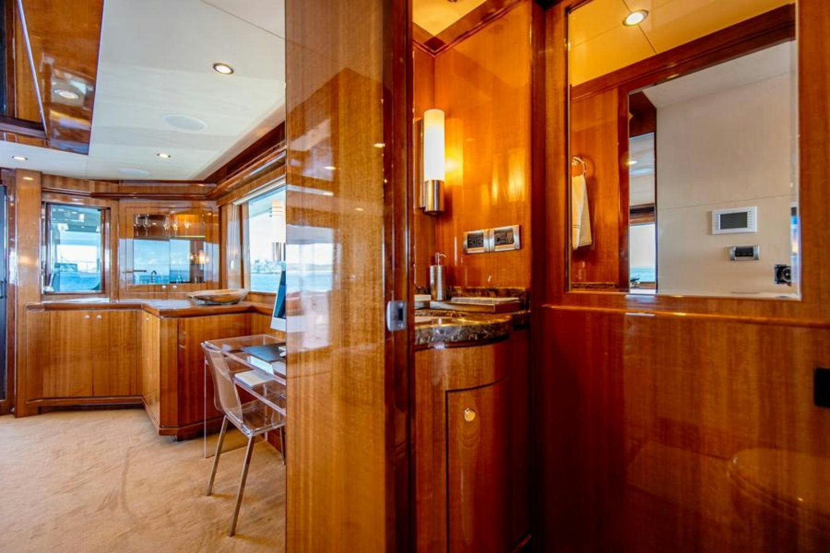 a kitchen with wooden cabinets aboard LODESTAR Yacht for Sale