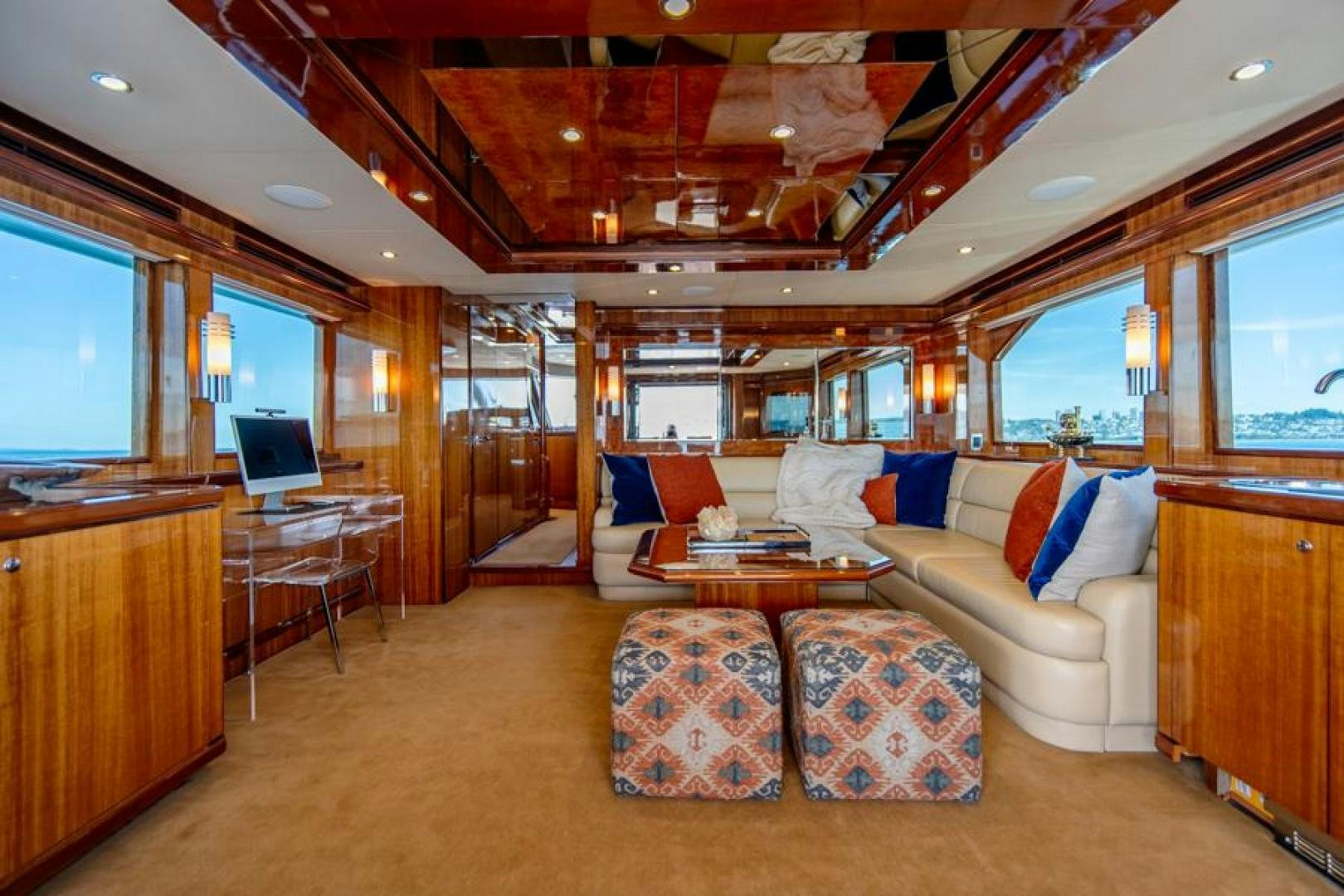 a living room with a large open window aboard LODESTAR Yacht for Sale