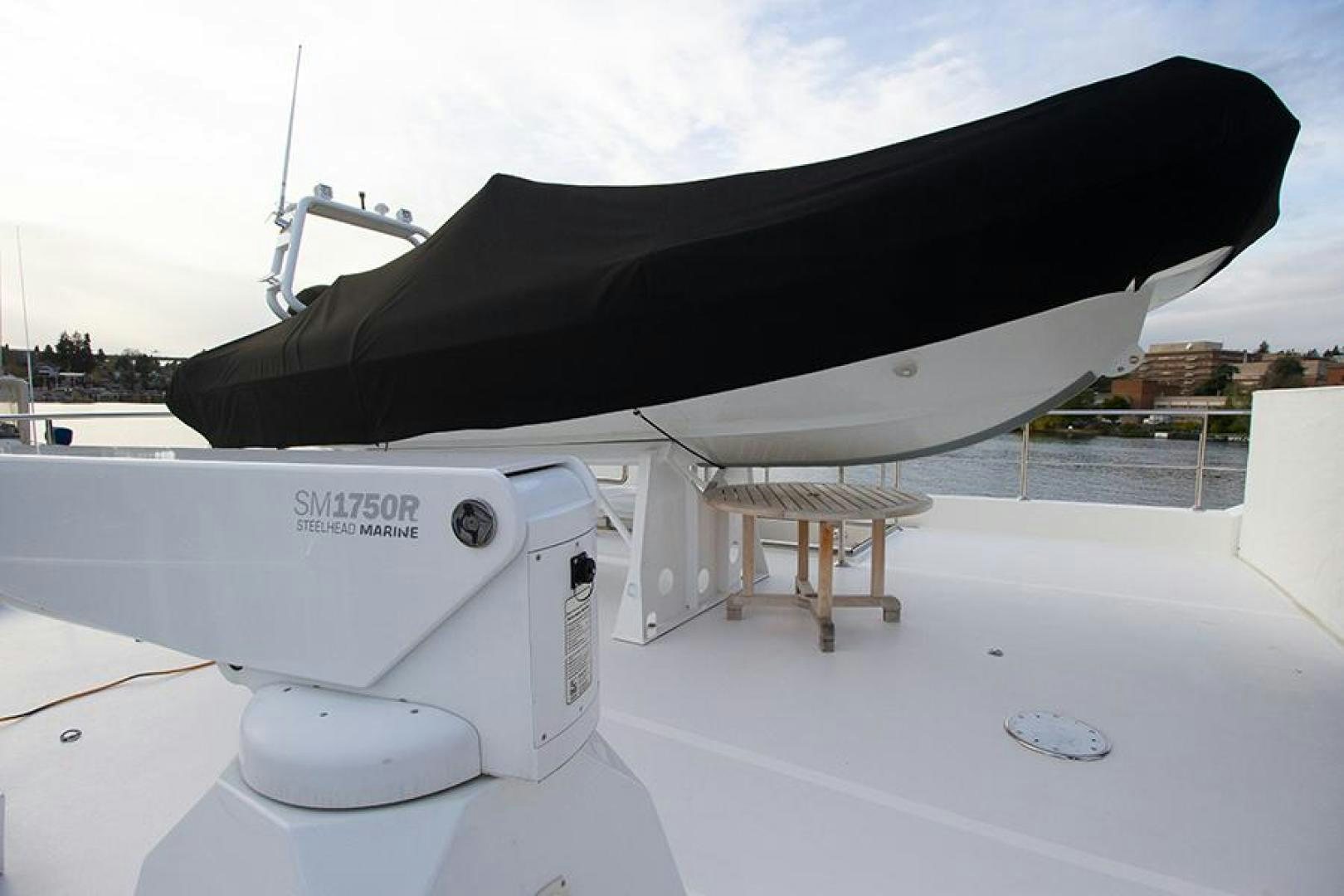 a large white submarine on a dock aboard LODESTAR Yacht for Sale