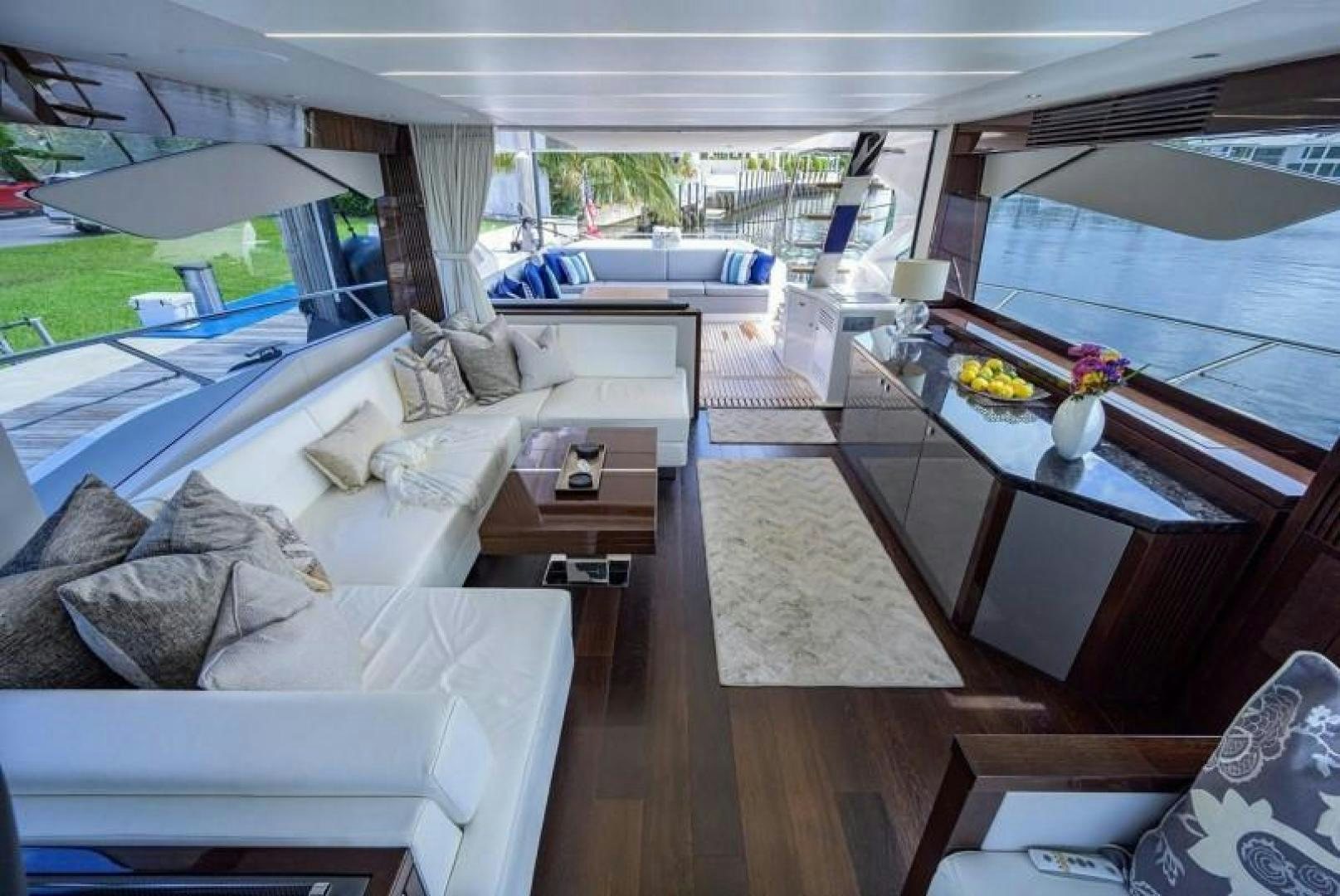 a living room with a large window aboard NIGHT STAR Yacht for Sale