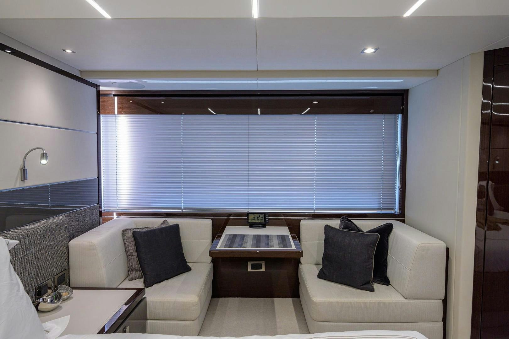 a room with a couch and a table aboard NIGHT STAR Yacht for Sale
