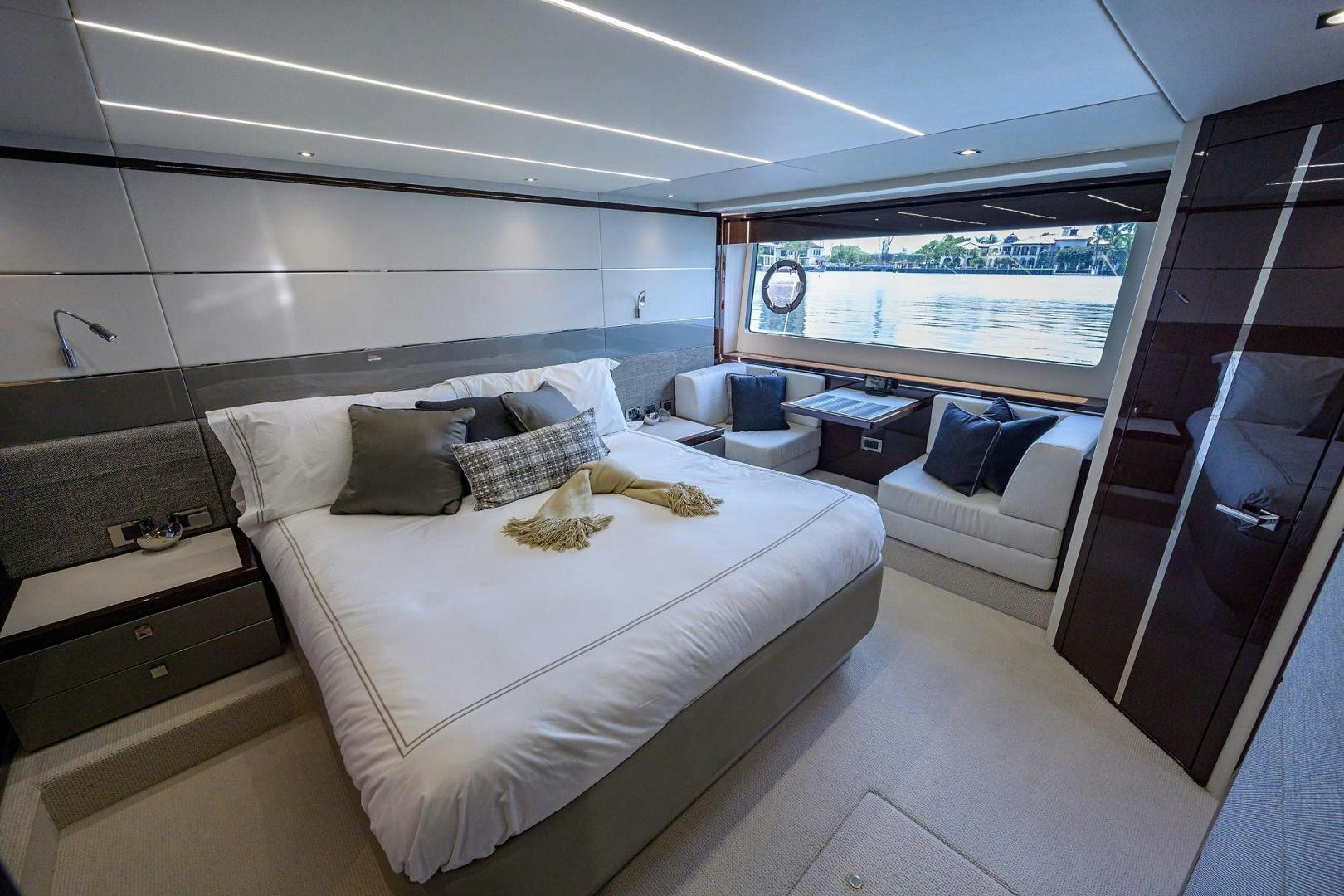 a room with a bed and a window aboard NIGHT STAR Yacht for Sale
