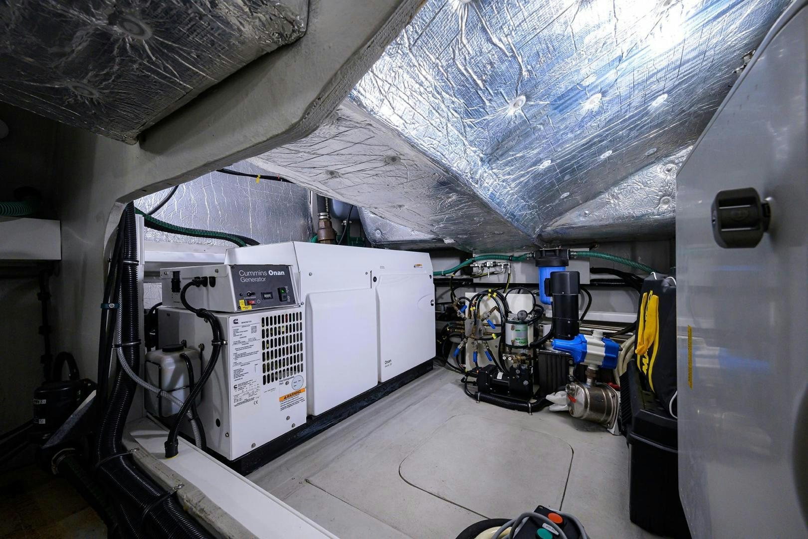a large white machine in a room aboard NIGHT STAR Yacht for Sale