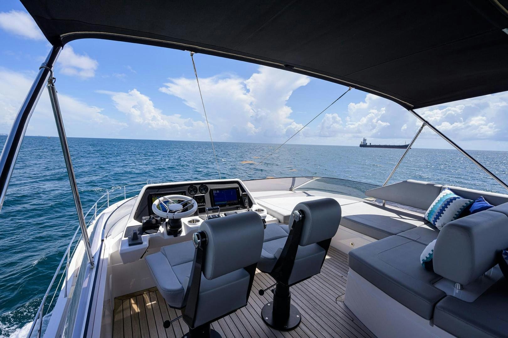 a boat with a view of the ocean and the ocean aboard NIGHT STAR Yacht for Sale
