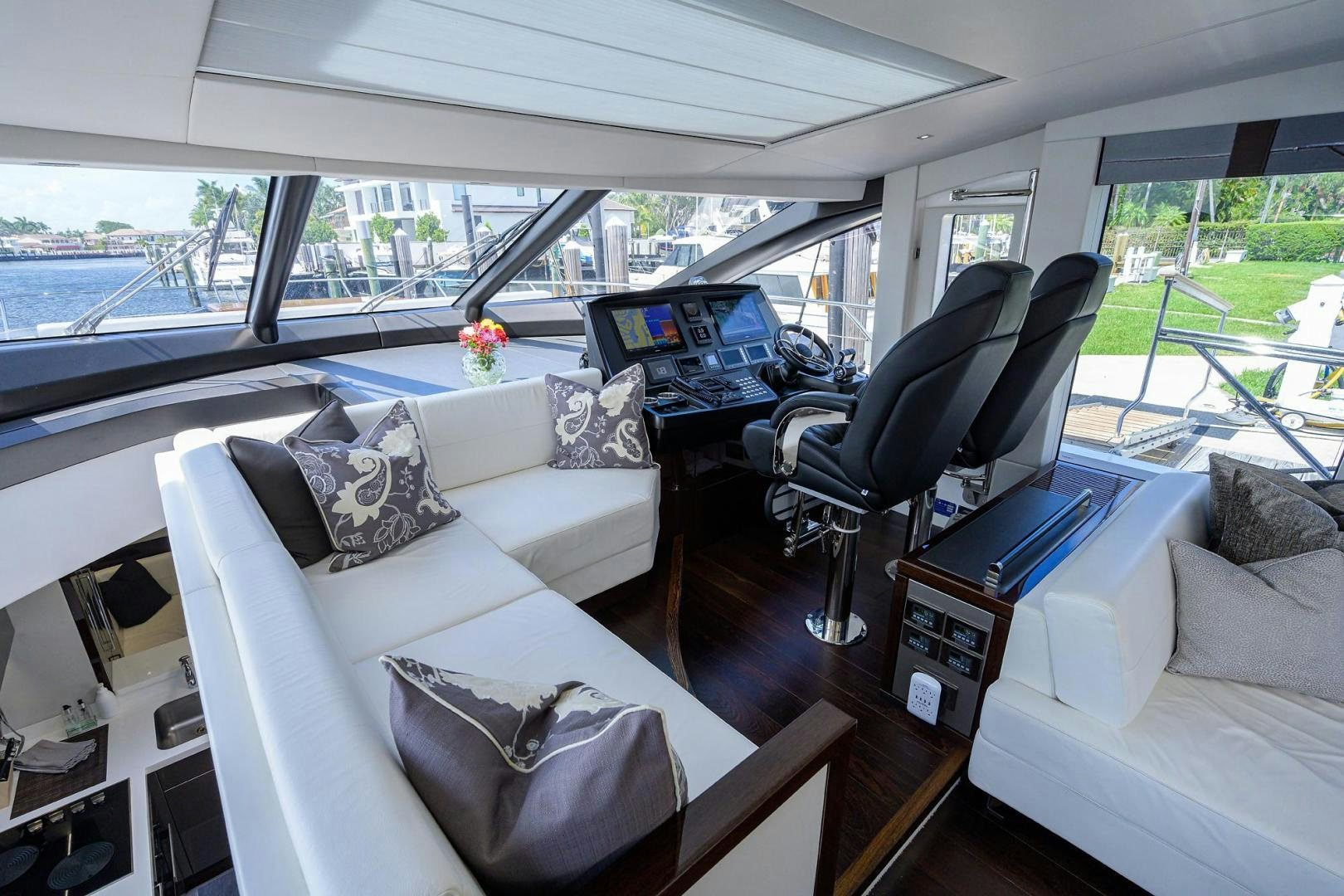inside of a car with a large window and a view of the trees aboard NIGHT STAR Yacht for Sale
