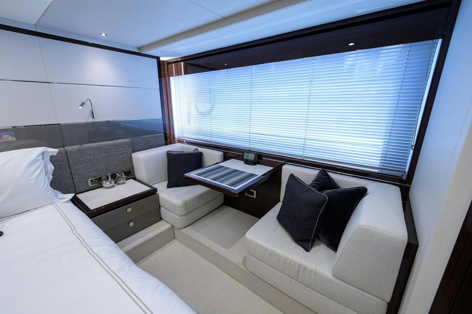 a room with a bed and a window aboard NIGHT STAR Yacht for Sale