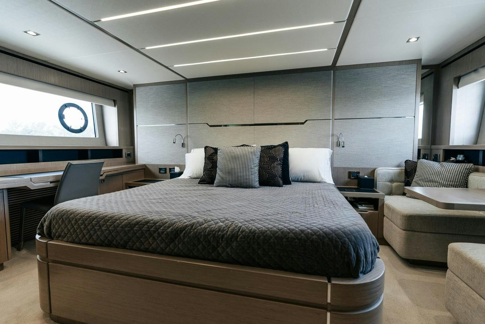 a bed in a room aboard GRAVITAS Yacht for Sale
