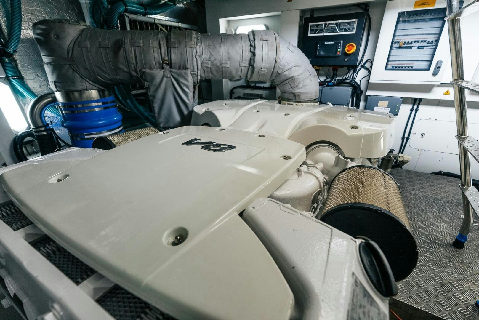 a person's hand on a machine aboard GRAVITAS Yacht for Sale