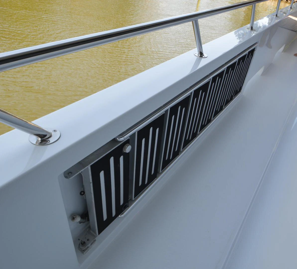 a close-up of a white piano aboard JOAN'S ARK Yacht for Sale