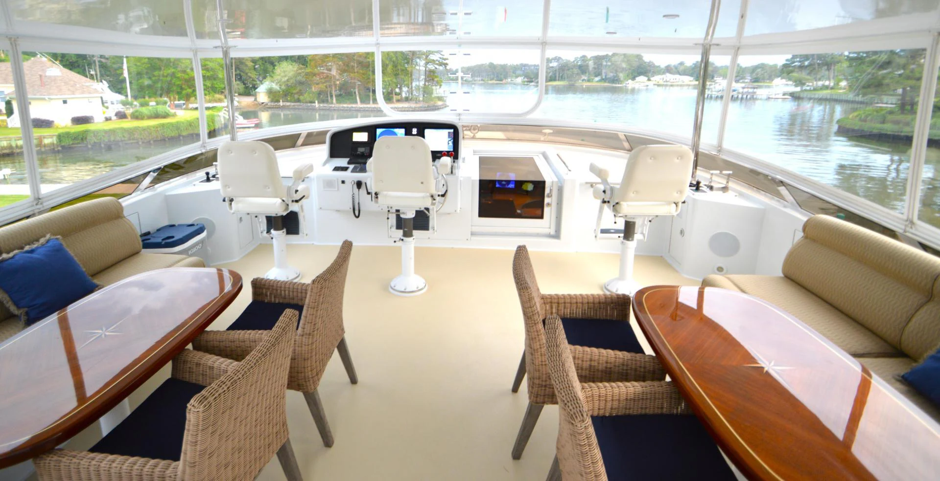 a room with a table chairs and a lamp on a table aboard JOAN'S ARK Yacht for Sale