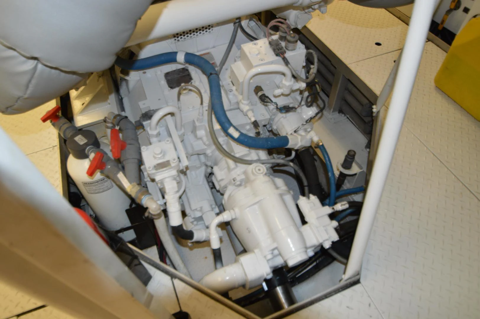 a white car engine aboard JOAN'S ARK Yacht for Sale