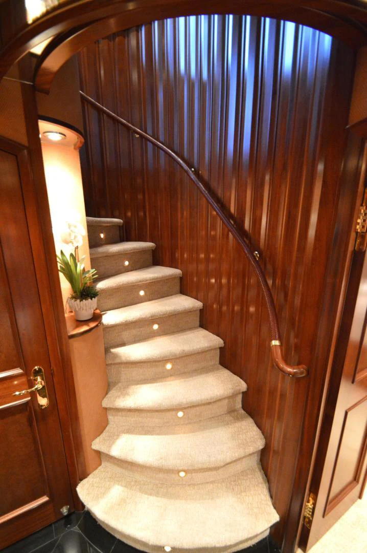 a staircase with a railing aboard JOAN'S ARK Yacht for Sale