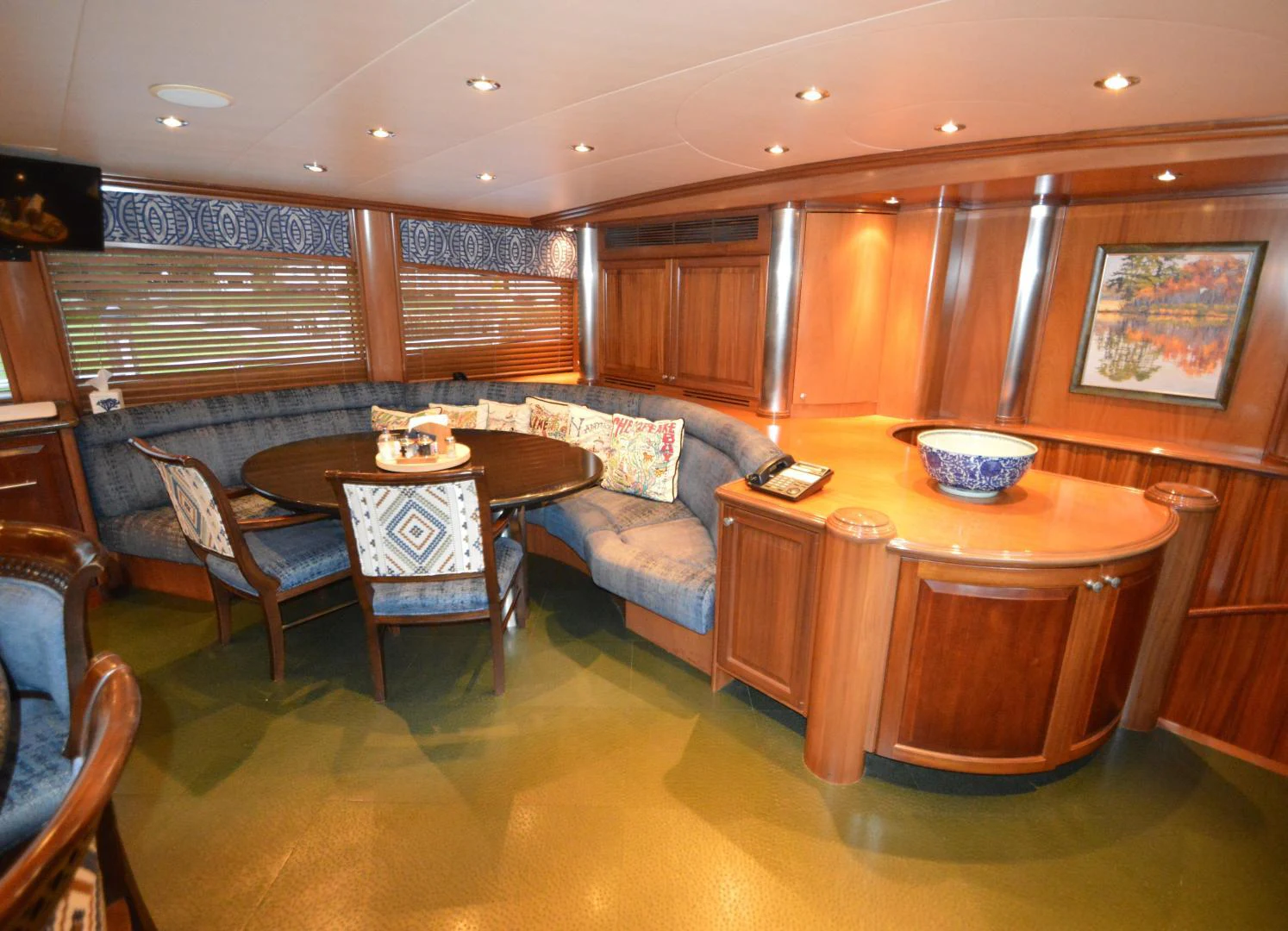 a living room with a couch and a table aboard JOAN'S ARK Yacht for Sale