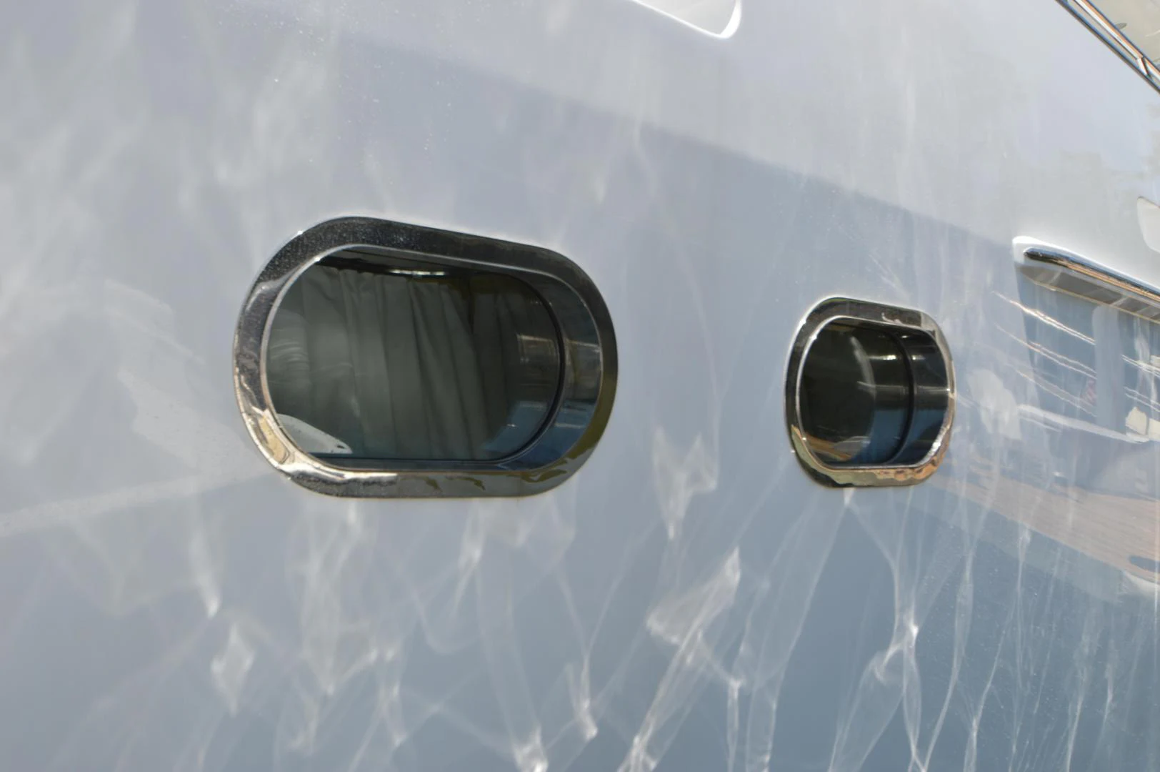 a pair of sunglasses on a car aboard JOAN'S ARK Yacht for Sale