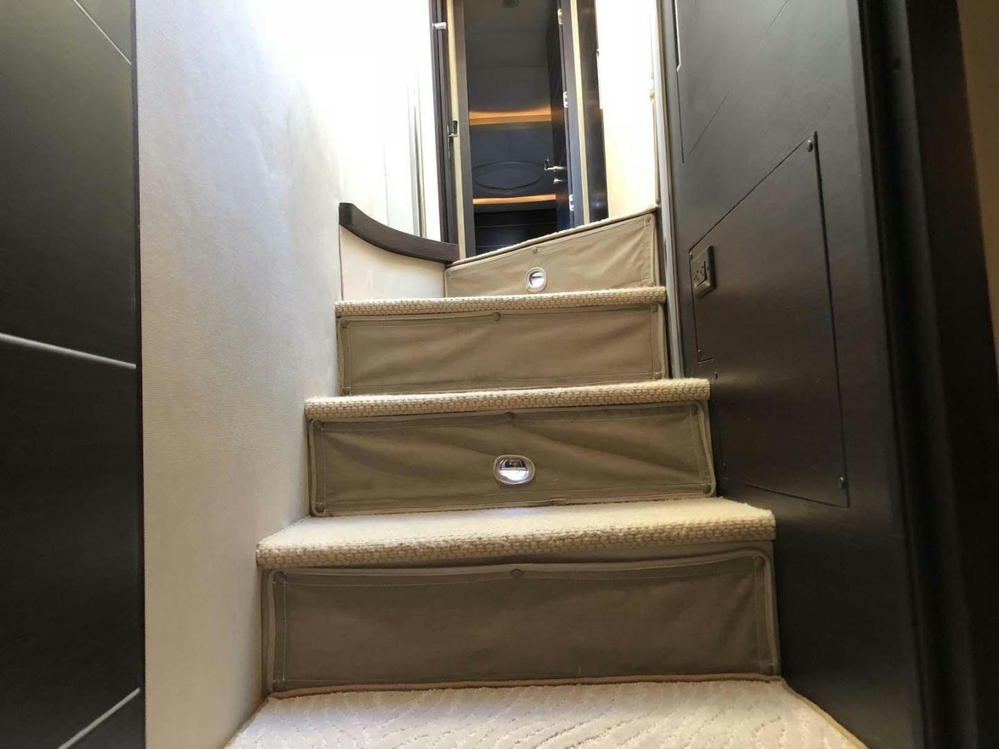 a brown leather seat on a train aboard ARTISTIC Yacht for Sale