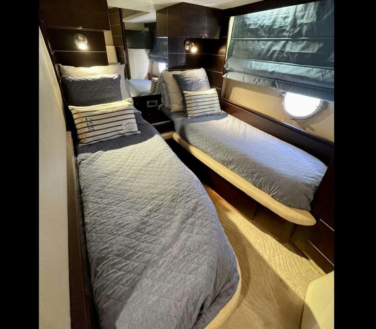 a room with two beds aboard ARTISTIC Yacht for Sale