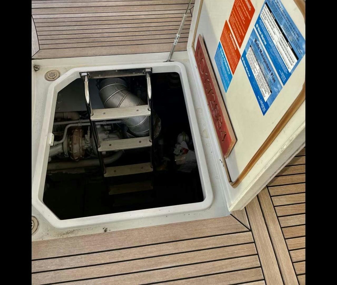 a window with a door open aboard ARTISTIC Yacht for Sale