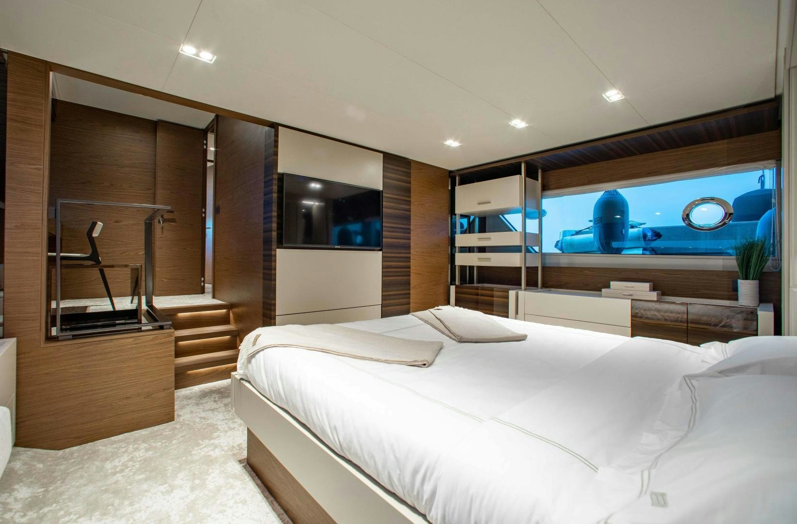 a room with a bed and a slide aboard Ferretti 670 Yacht for Sale