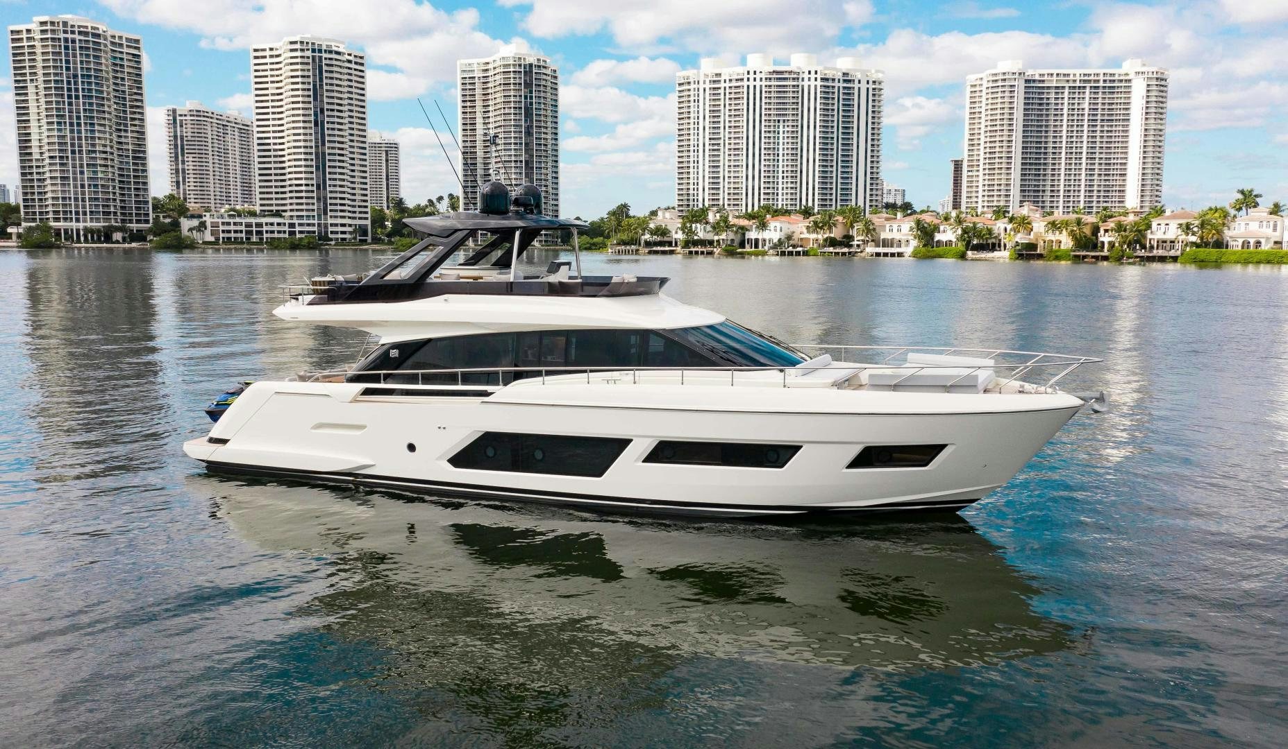 a white yacht in the water aboard Ferretti 670 Yacht for Sale