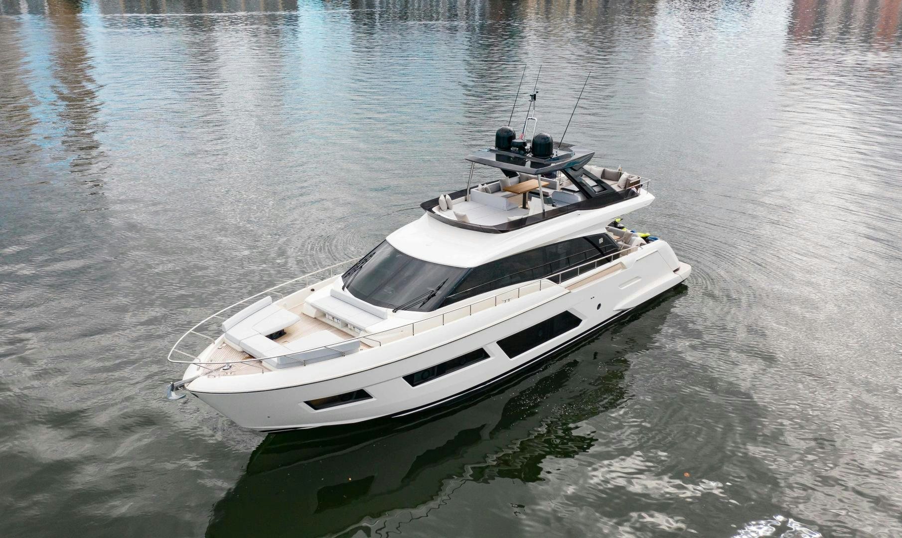 a boat on the water aboard Ferretti 670 Yacht for Sale