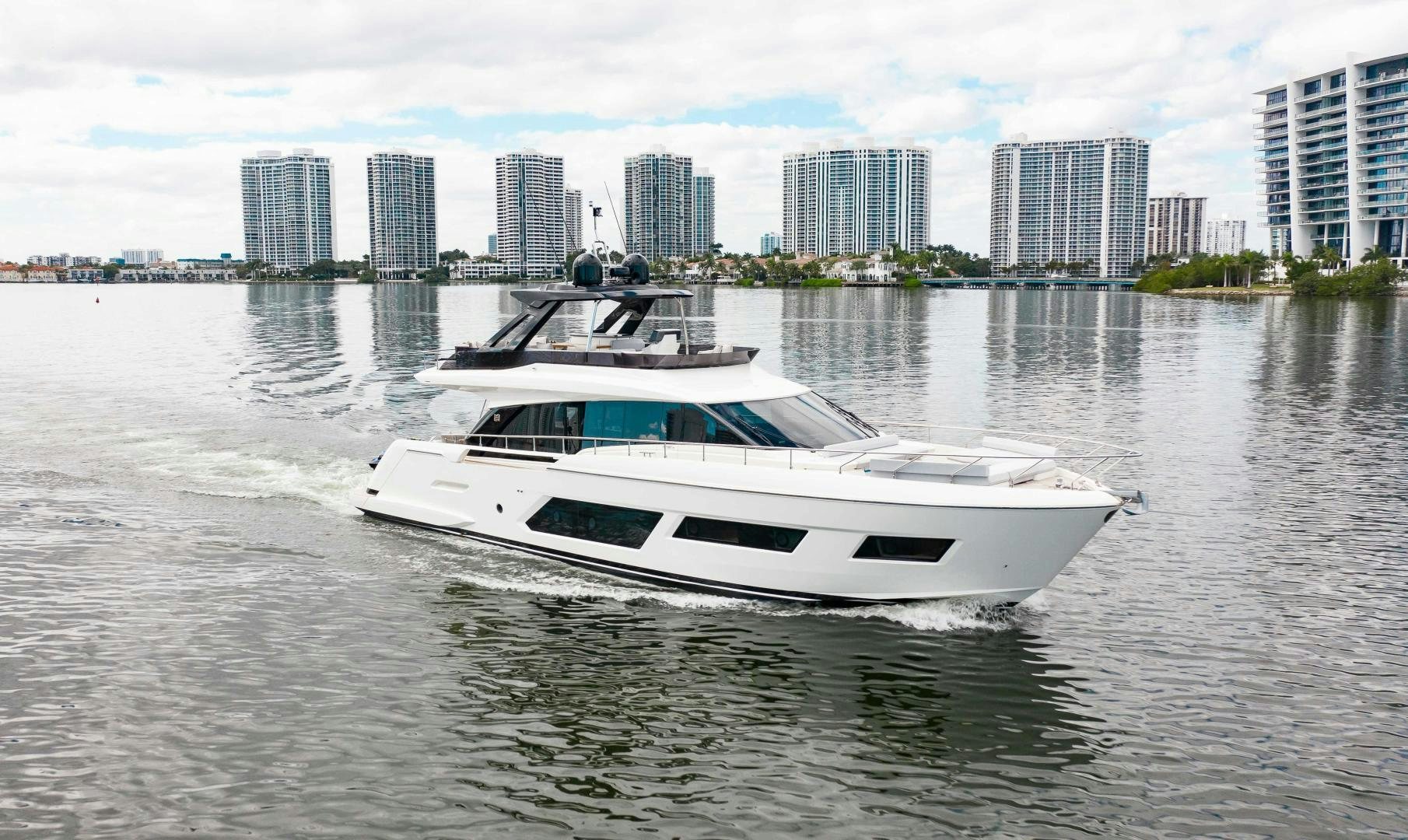 a boat on the water aboard Ferretti 670 Yacht for Sale