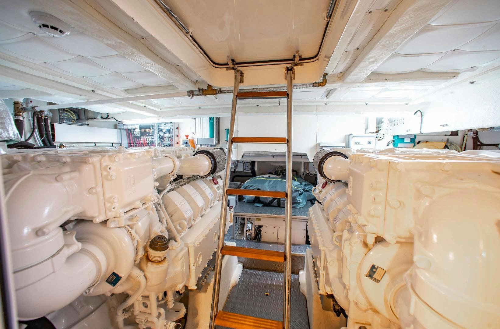 a room with a ladder and a large white object aboard Ferretti 670 Yacht for Sale