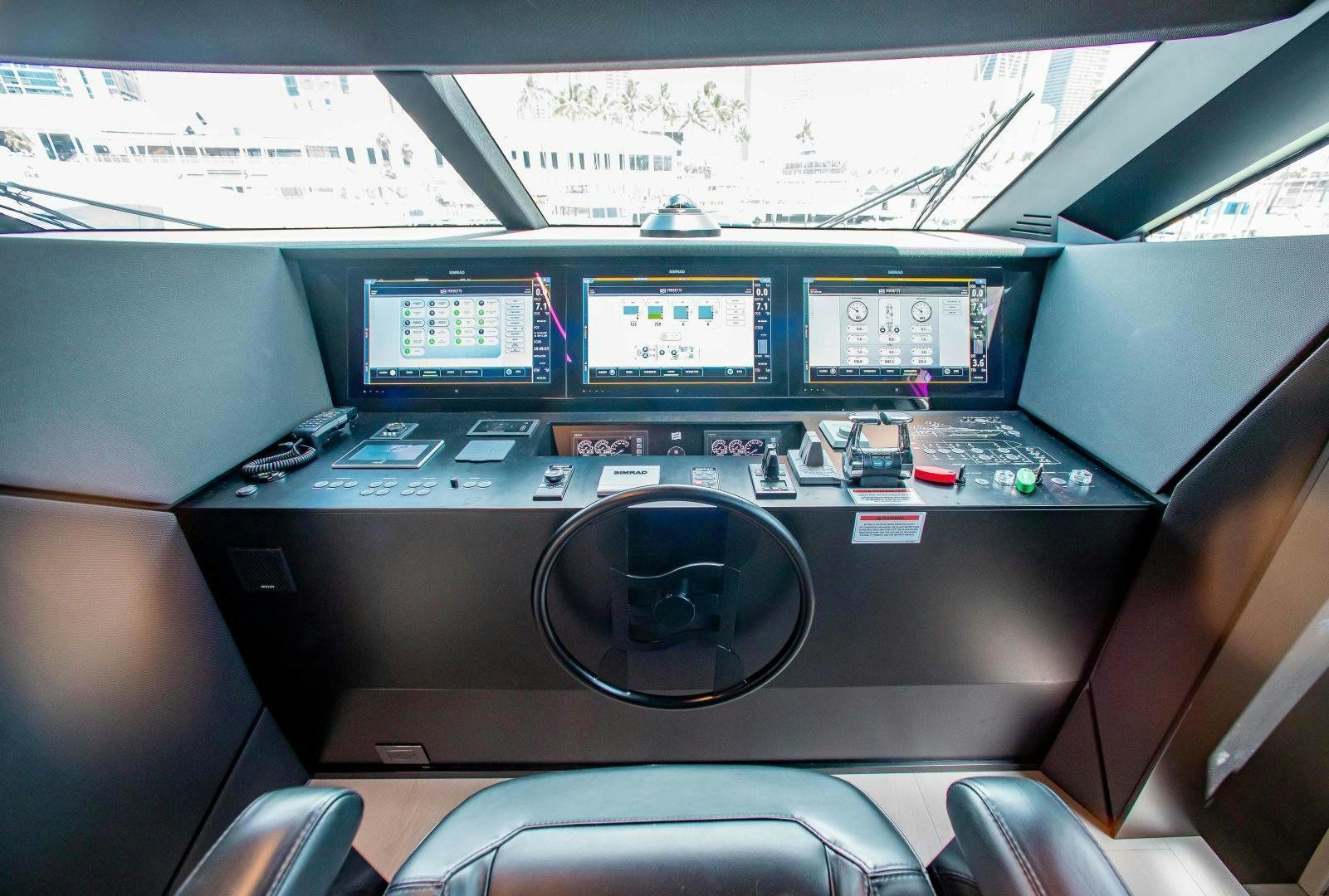 a control panel in a car aboard CRAZY Yacht for Sale