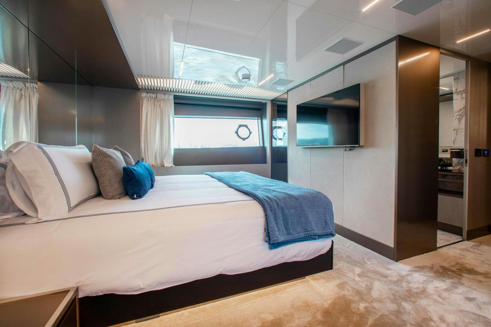 a bed in a room aboard CRAZY Yacht for Sale