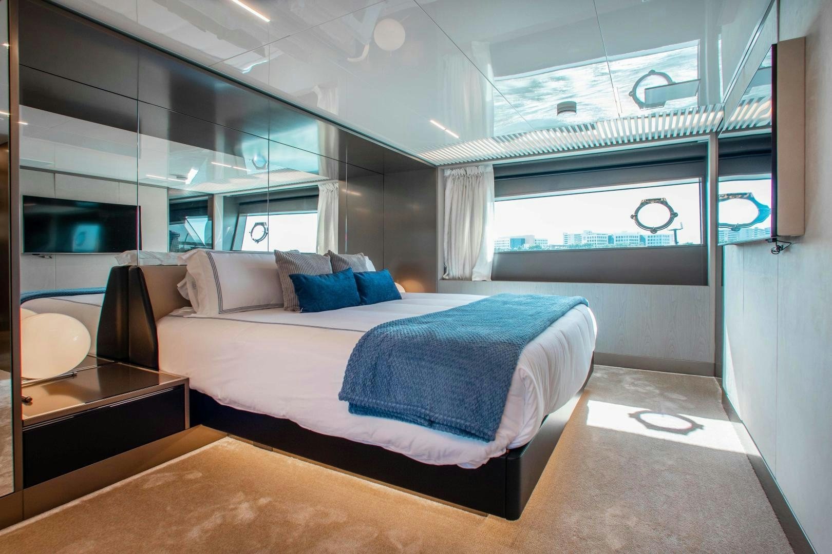 a bed in a room aboard CRAZY Yacht for Sale