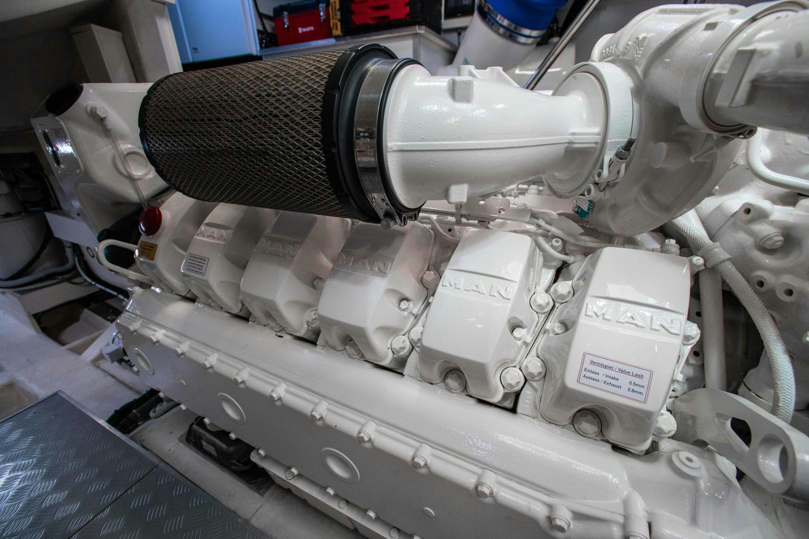 a machine with a large metal cylinder aboard CRAZY Yacht for Sale