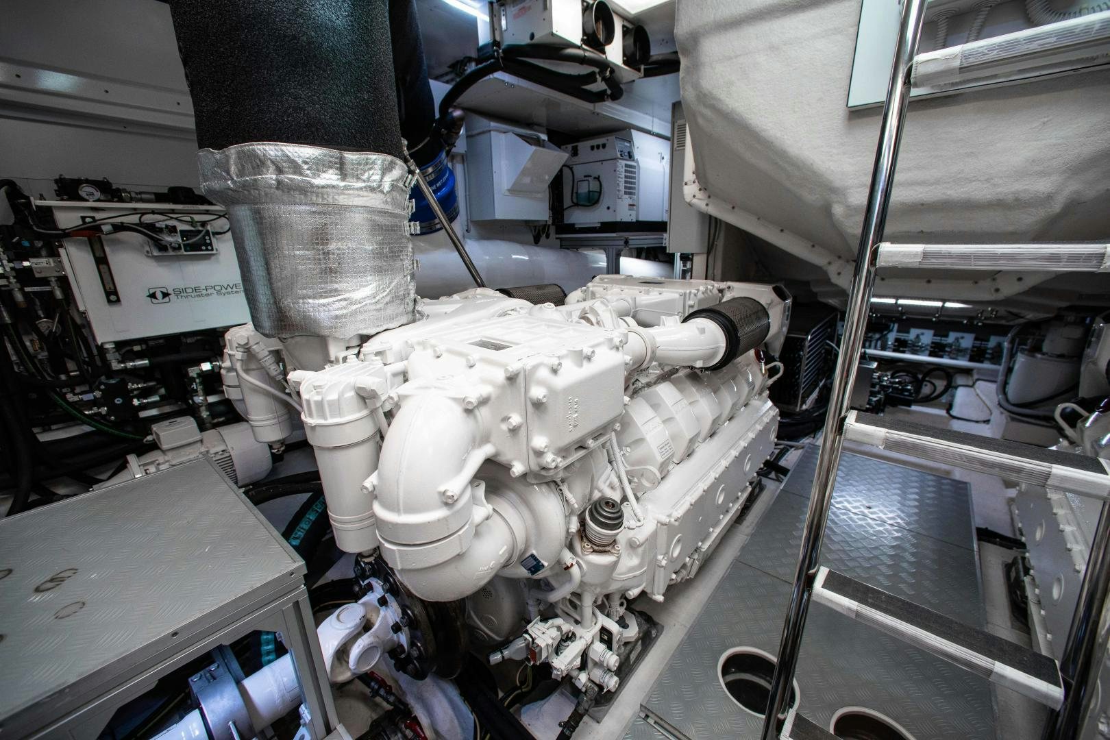 a machine with a large metal cylinder aboard CRAZY Yacht for Sale