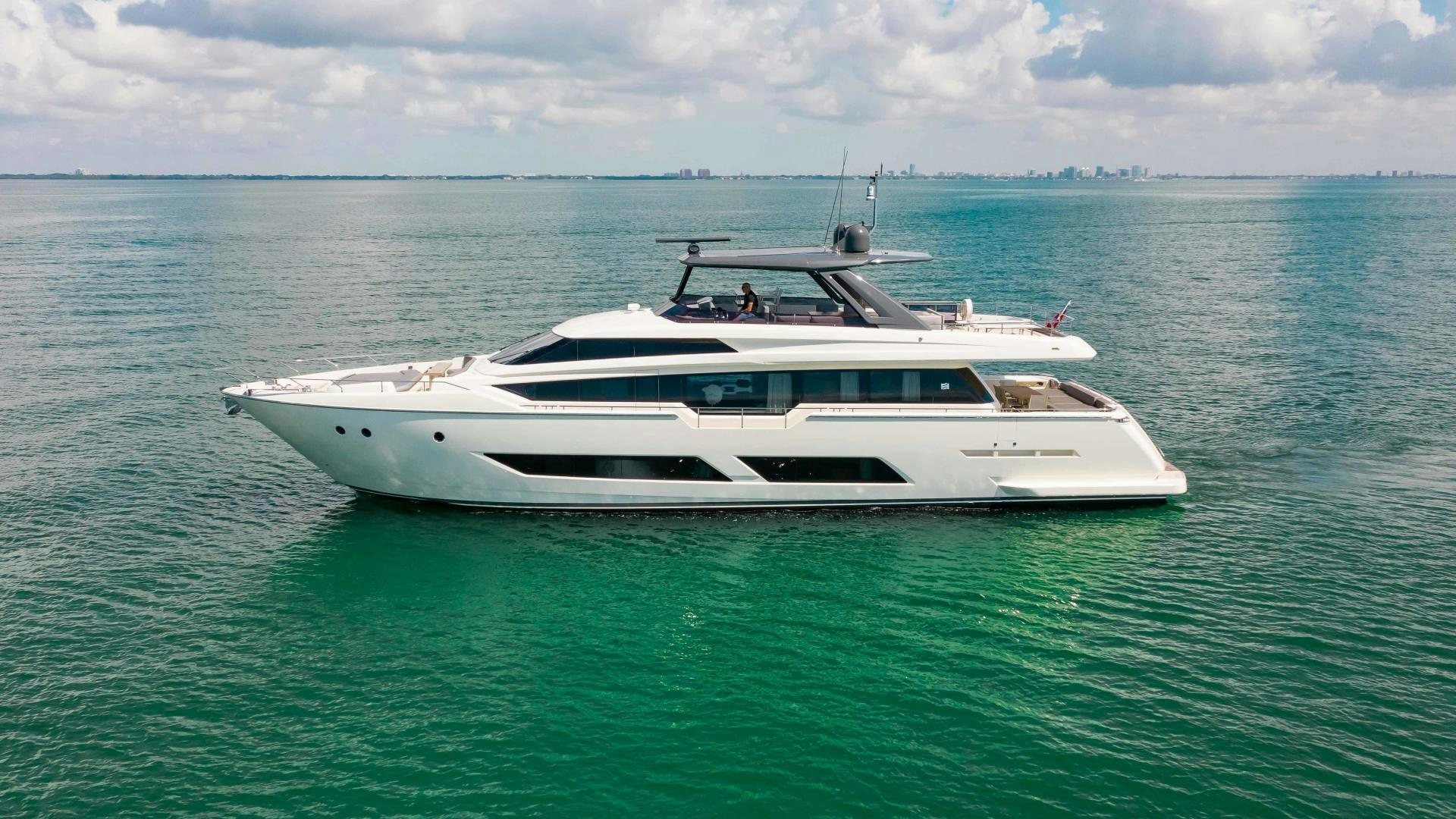 a white boat in the water aboard CRAZY Yacht for Sale