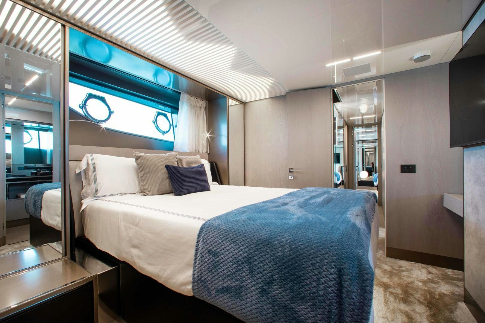 a bed in a room aboard CRAZY Yacht for Sale