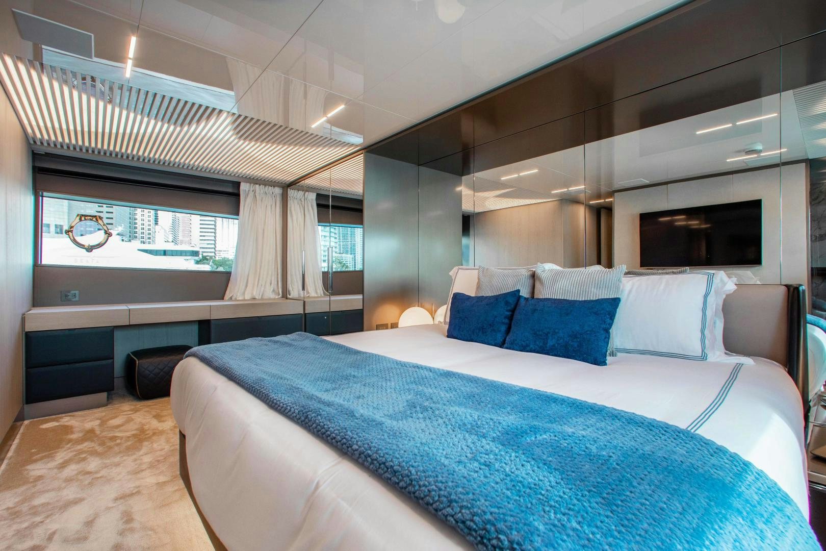 a large bed in a room aboard CRAZY Yacht for Sale