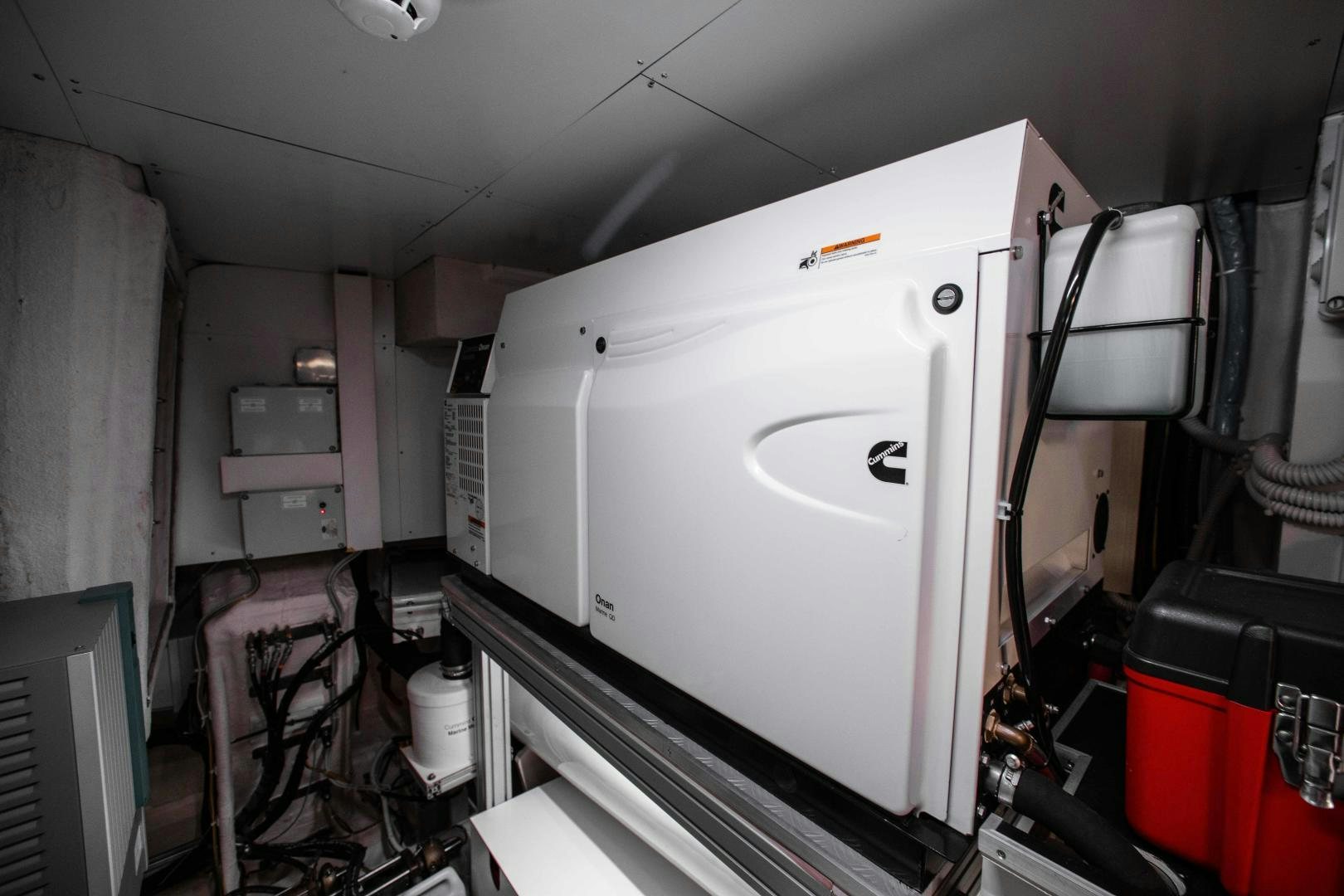 a large white machine aboard CRAZY Yacht for Sale