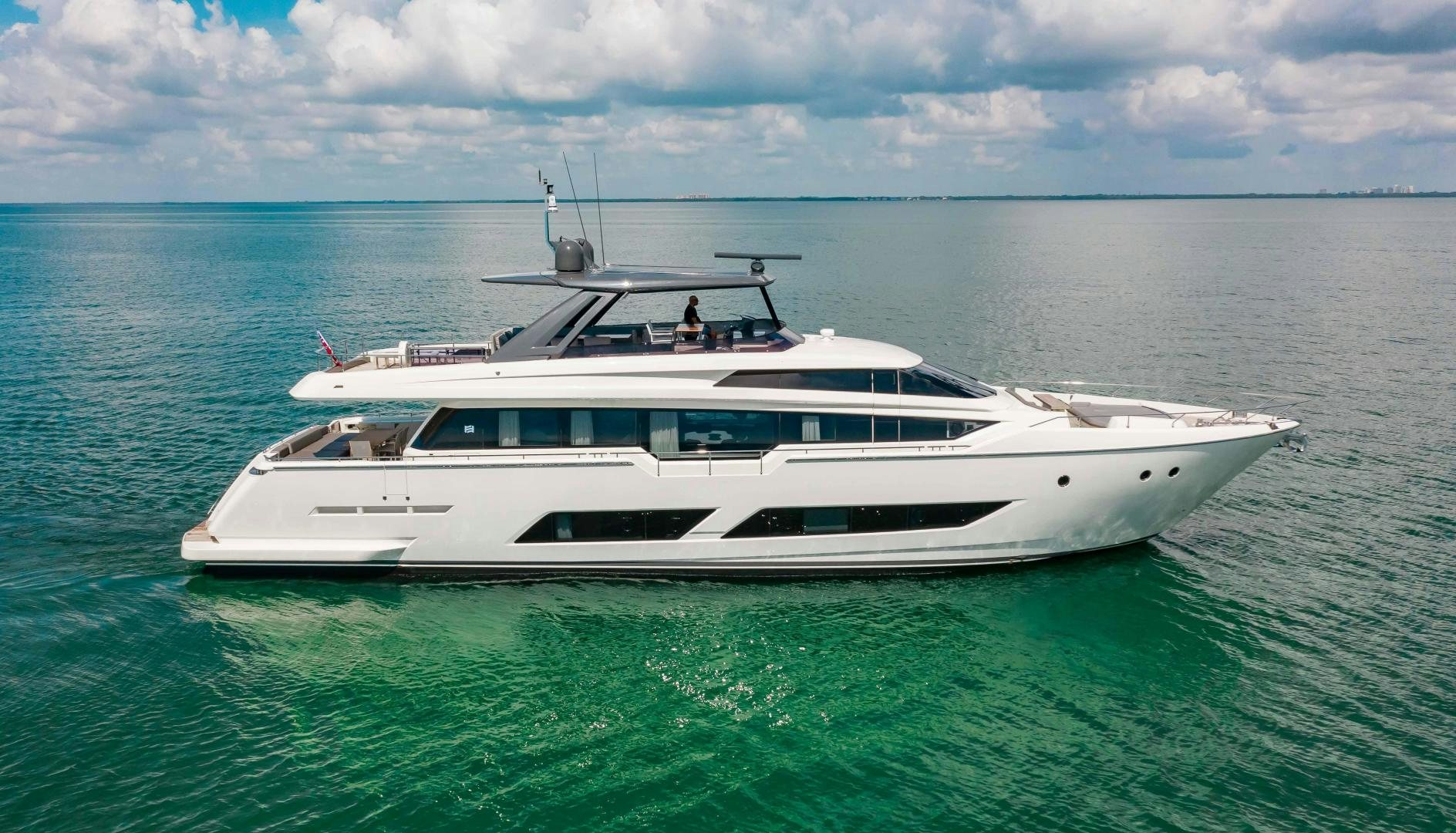 a white boat in the water aboard CRAZY Yacht for Sale