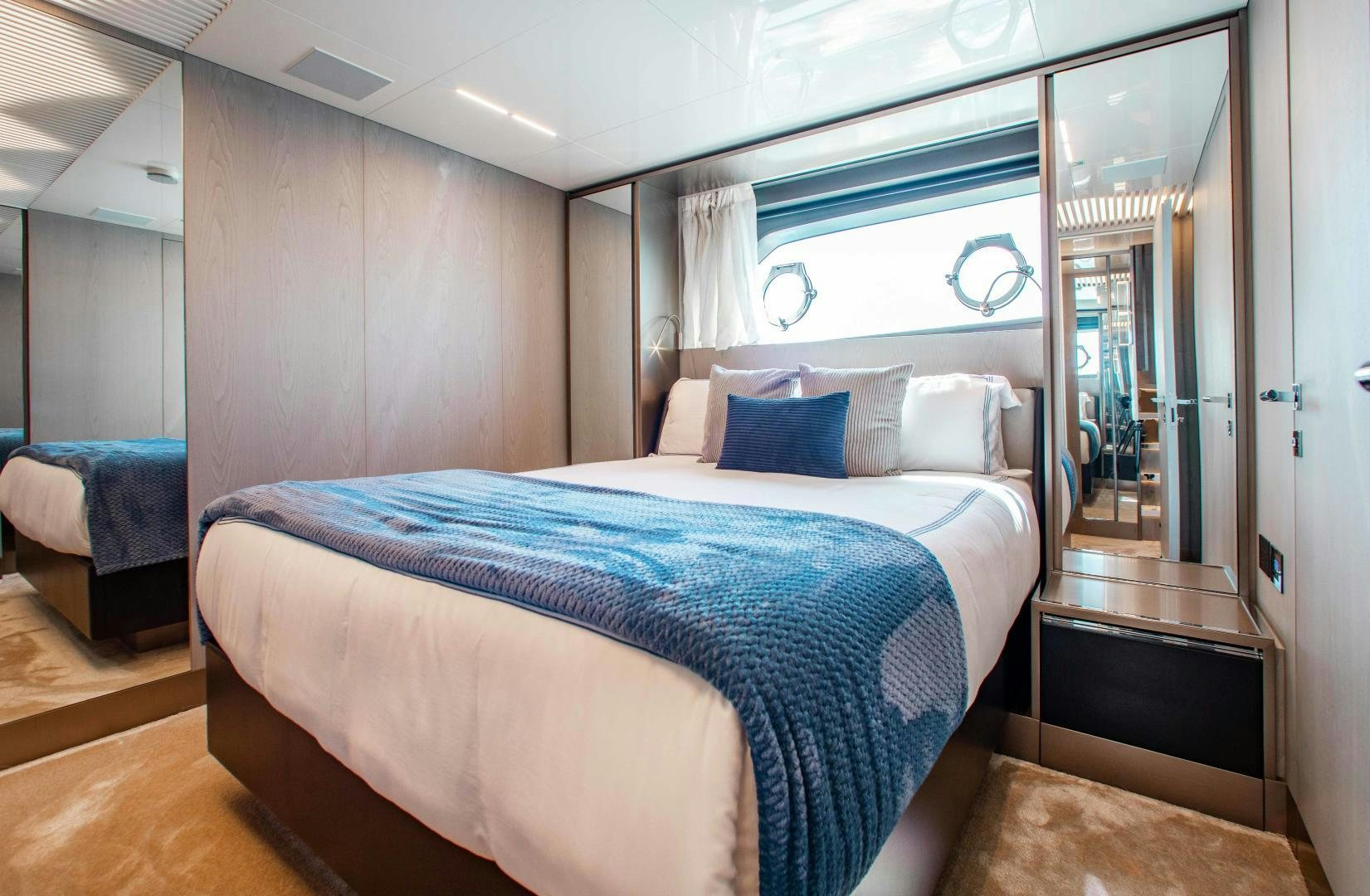 a bed in a room aboard CRAZY Yacht for Sale
