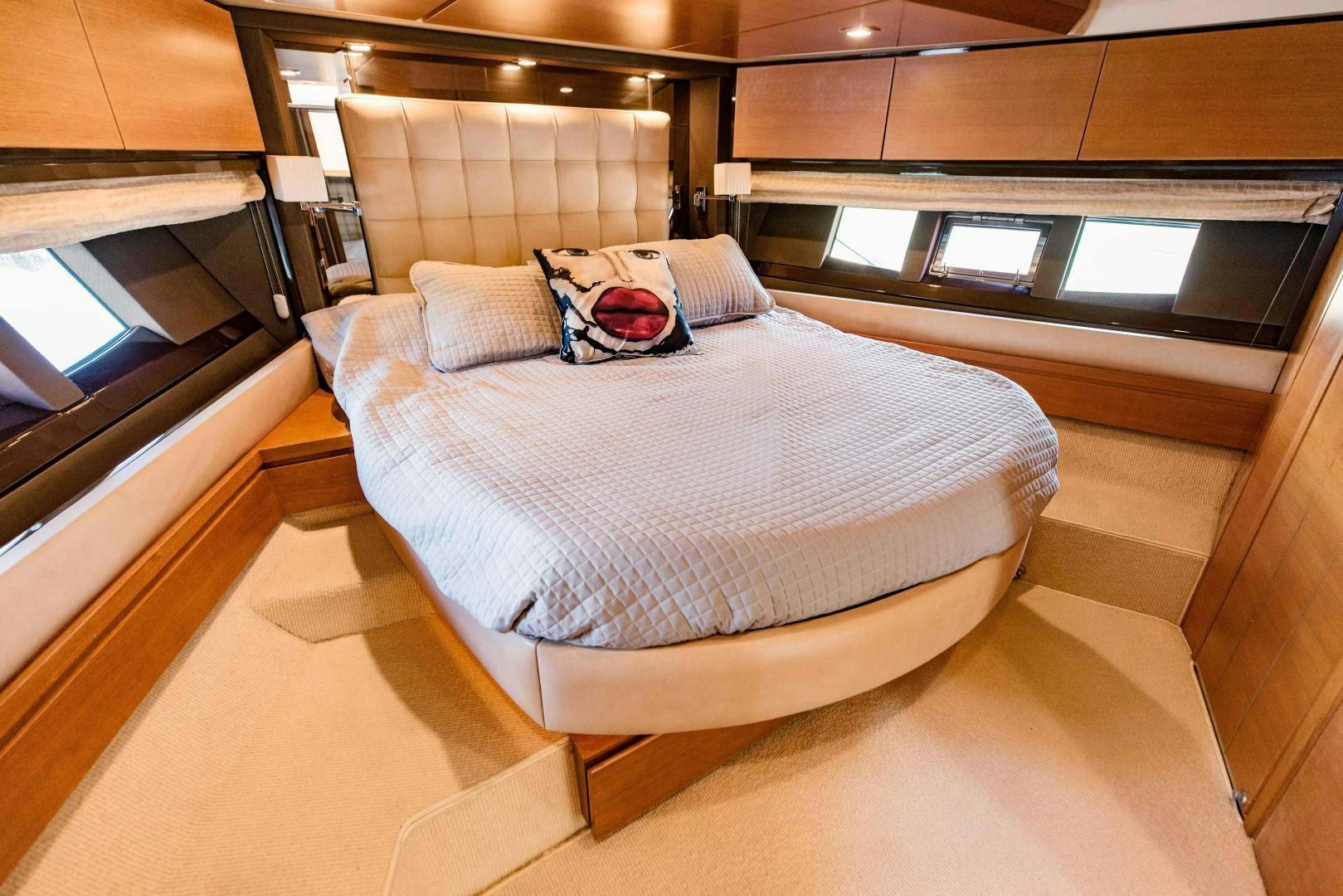 a bed in a room aboard Azimut 70 Yacht for Sale