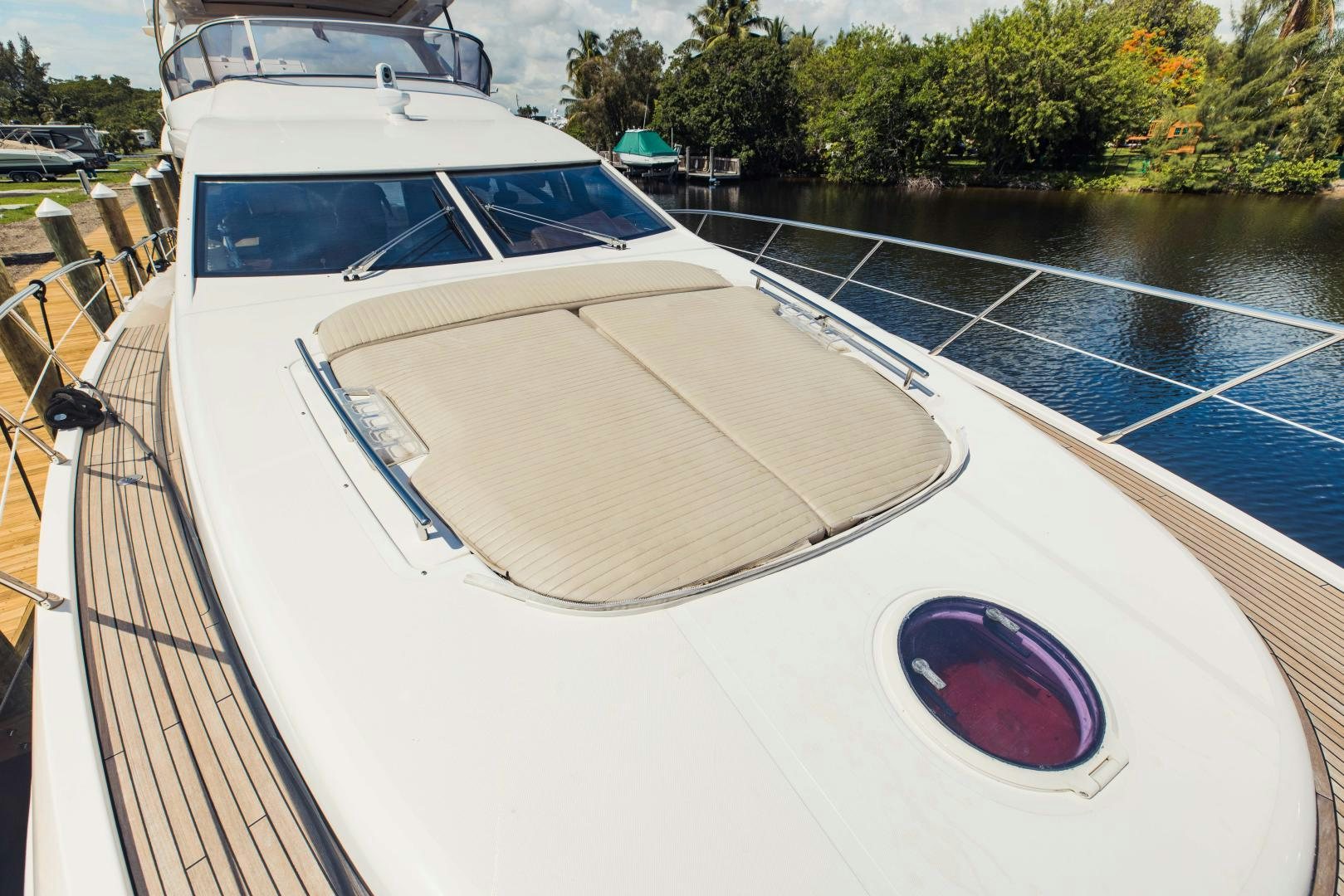 a boat on the water aboard Azimut 70 Yacht for Sale