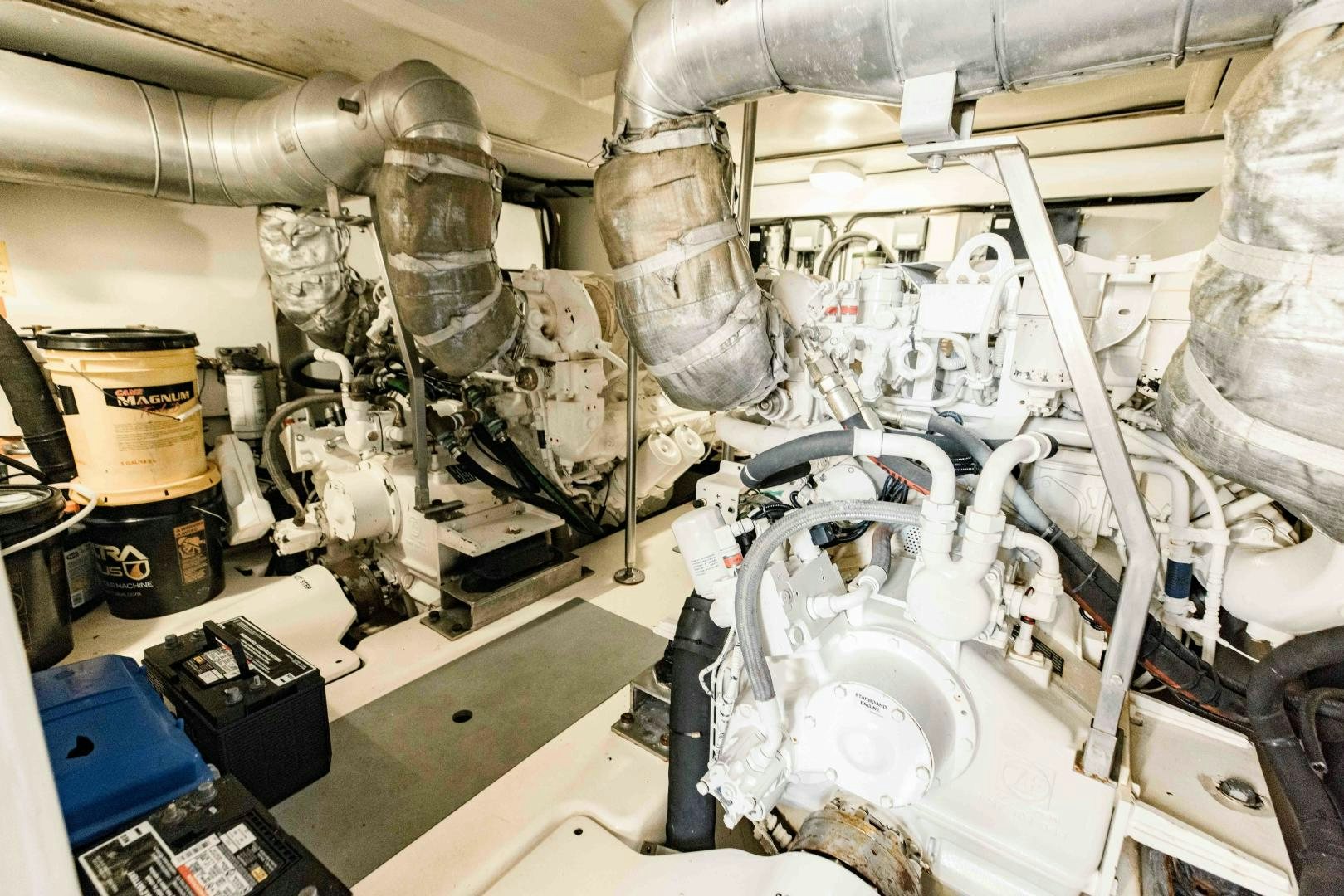 a close-up of a car engine aboard Azimut 70 Yacht for Sale